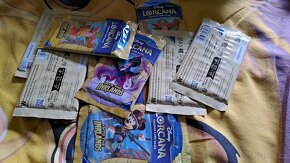 Lorcana booster packy a illumineer's trove