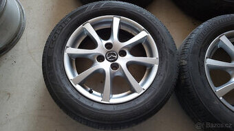 Orig. letní ALU kola 15" 4x100 Mazda 2 (2015 a novější)