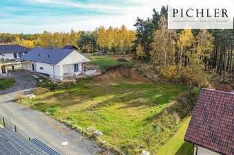 Prodej stavebního pozemku 1265 m² Lužná