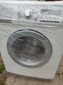 pračka se sušičkou Aeg 7/4 kg,0-1600 ot./malá lednice - 1