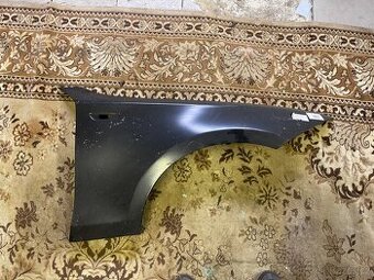 Pravý blatník BMW E87 Nový