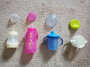 Různé kojenecké lahvičky + pítka + pleny