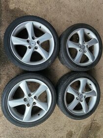 Prodám sadu Alu disků MAZDA 7Jx17H2 ET55 + pneu 215/45/17