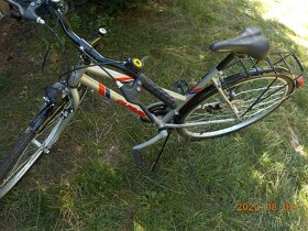 Stará jízdní kola a nové trek kolo OLPRAN