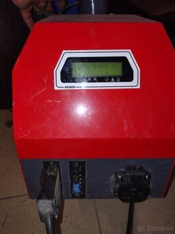 Hořák Atmos na pelety.