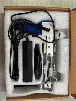 Stroj na tkaní koberců