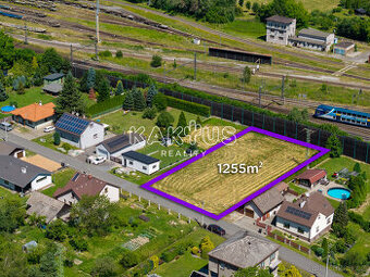 Prodej stavebního pozemku 1255 m2, ul. U Důlňáku, Bartovice