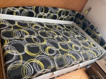 Rohová čalouněná postel