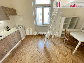 Pronájem 1+kk 22m2 P5 Smíchov zařízený po rekonstrukci cihla