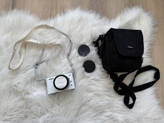 Fotoaparát Nikon 1 J1 + objektiv 10-30mm VR bílý