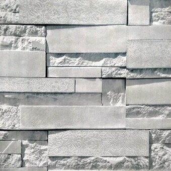 Tapeta vzor Světlý kamenný obklad s dekorativními rytinami