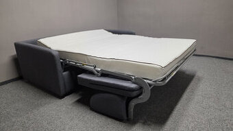 Nový rozkládací gauč s postelí šedá látka