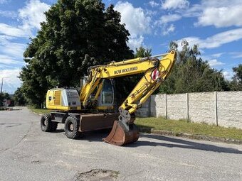 Kolové rypadlo / nakladač New Holland MH CITY