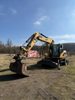 Kolový bagr Caterpillar M 313D