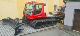 Sněžná rolba Kässbohrer Pistenbully 100 frézou a 2 stopaři