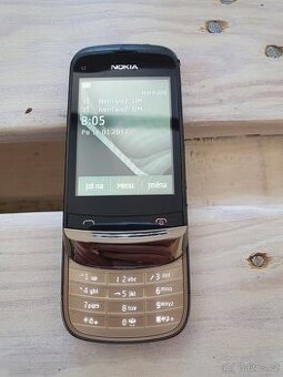 Nokia C2-03 s pouzdrem, nabíječkou.