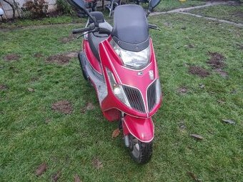 Kymco Yager 125, Dink 125 - 1