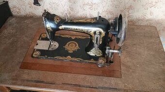 Starozitny sici stroj