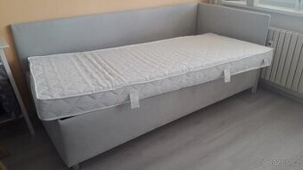 Čalouněná postel s úložným prostorem