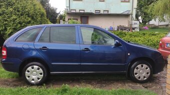 Škoda Fabia + letní a zimní pneu - 1