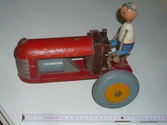 Prodám různé plechové a dřevěné hračky. Dřevěný červený trak