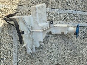 nadrž odstrikovacu vc.motorku VW Passat B6