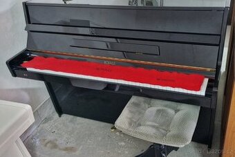 Černé piano Royale se židlí r. v. 1994