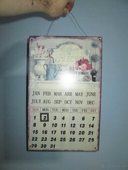 Plechový kalendář s posuvníkem