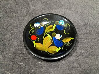 Dřevěný nástěnný obrázek.