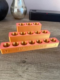 Stojan na Juicy Bomb