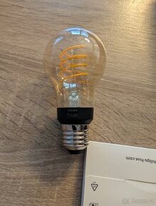 Žárovky Philips HUE white filament 7W E27 A60