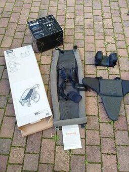 Miminkovnik Thule infant Sling a opora hlavy a trupu