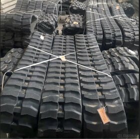 Gumové pásy na bagry a minibagry