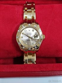 Zlaté dámské hodinky Rolex s diamanty - 1