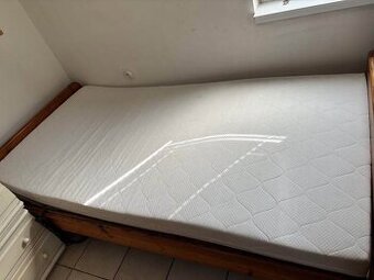 Postel s el. polohovacím roštem vč. matrace