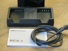 OM System nabíječka BCX-1 + akumulátor BLX-1