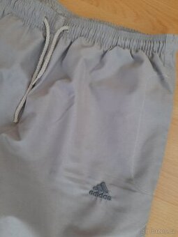 Dámské tepláky - šusťáky vel. M