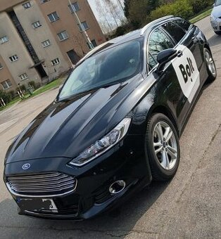 Nejlevnější pronájem taxi/rozvoz Ford Mondeo kombi s polepem