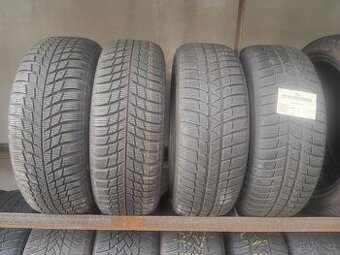 4xzimní pneu 205/60/26. Bridgestone.