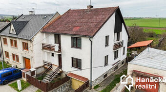 Prodej prostorného RD se zahradou a garáží v...