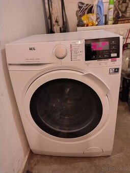 Aut.pracka .AEG-zaruka..