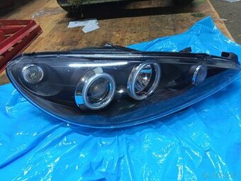 Přední světlomet 1ks pouze pravý na Peugeot 206 02 -07.