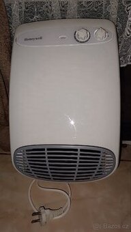 Nástěnný horkovzdušný ventilátor Honeywell