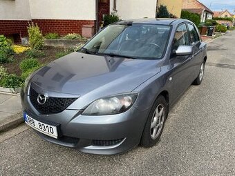 Mazda 3 1,4 - 1