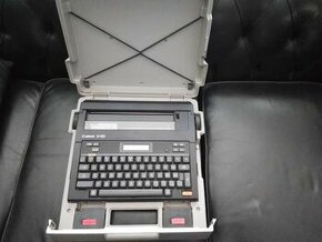 Elektrický kufříkový psací stroj CANON