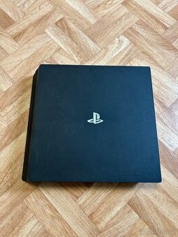 Playstation 4 Pro 1TB + 4 hry