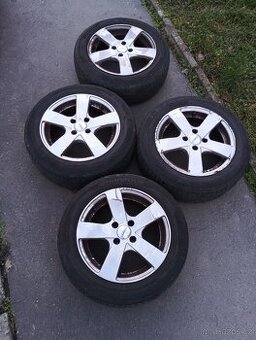 Litá kola 4x100 J6,5x15 ET38 s letním obutím 185/60 R15