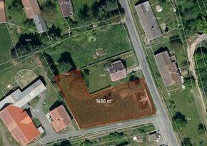 Prodej stavebního pozemku 1630 m2 v obci Chyjice