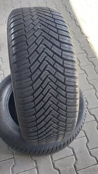 Prodám 2 x celoroční pneu Continental 235/55/18