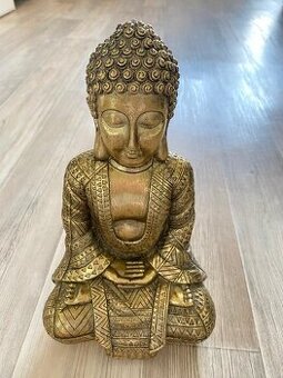 Zlatá soška Buddha